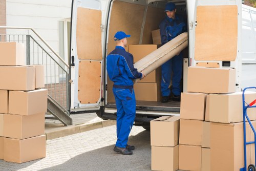 Removal team helping with a home move in Ealing