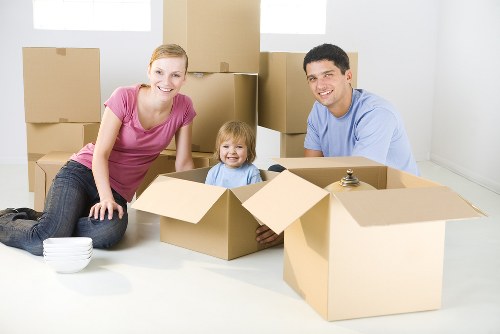 Movers handling furniture with care during a local removal
