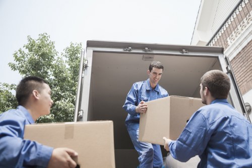 Careful loading of office boxes and IT equipment during an Ealing move