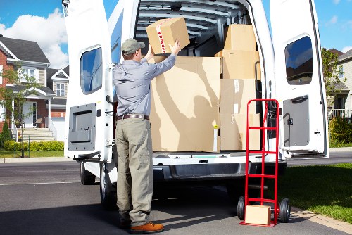 Local movers loading items from an Ealing property