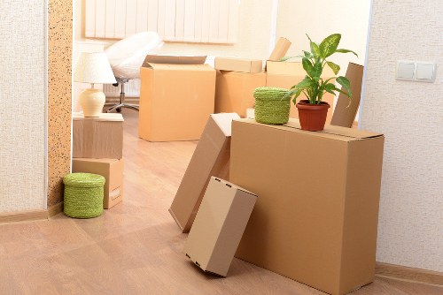 Packing boxes and furniture prepared for a move in Ealing