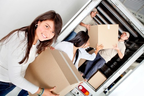 Loading furniture into a moving truck for an Ealing relocation